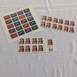 Three books of 33-cent stamps from Christmas 1998